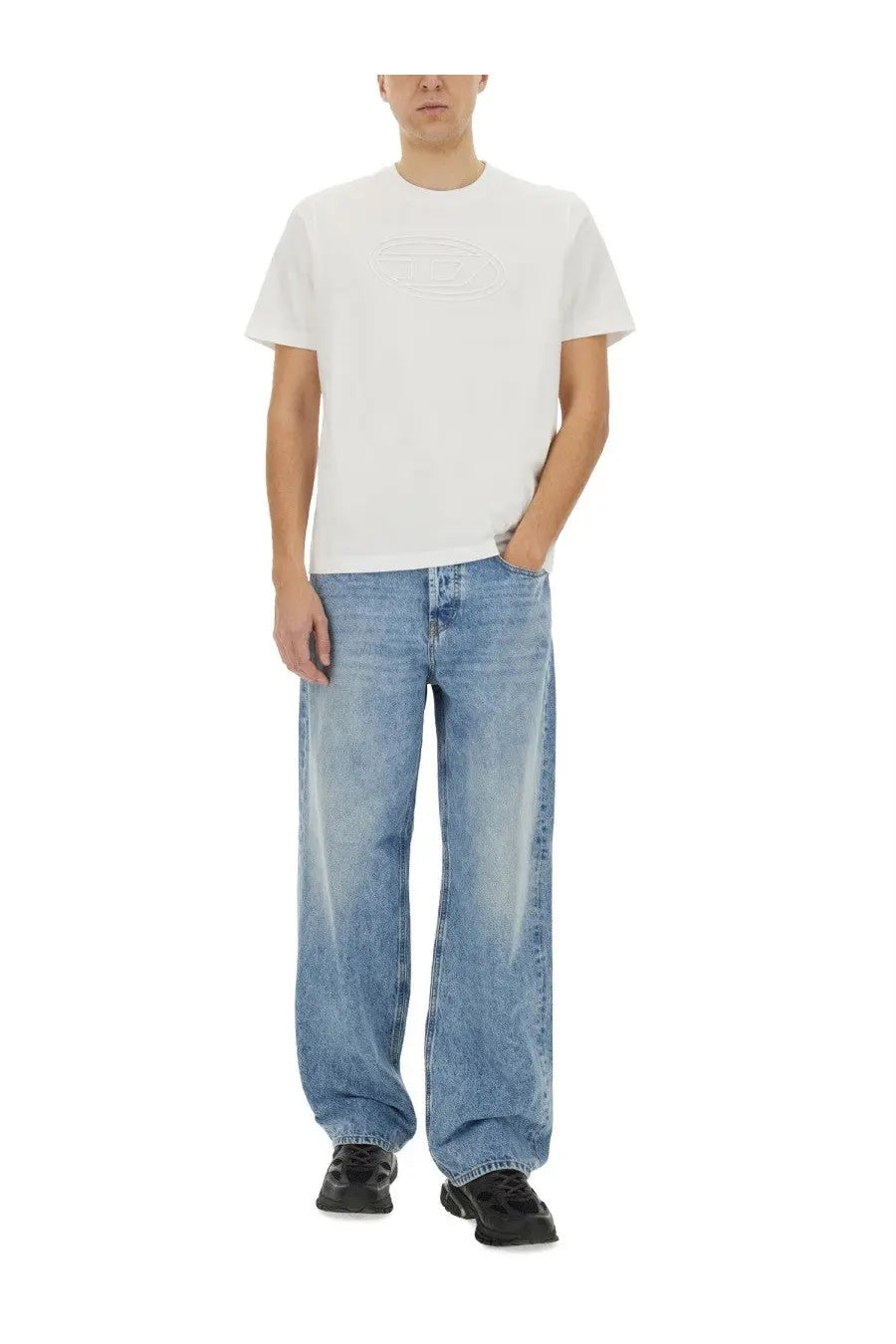 White cotton t-shirt with subtle embossed logo on chest paired with diesel men’s jeans macro blue product image
