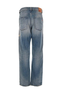 Diesel men’s jeans macs blue distressed medium-wash denim with faded blue hue and frayed hems