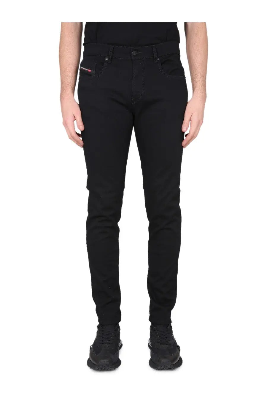 Diesel men’s slim fit black jeans showing back side with subtle branding on the back pocket