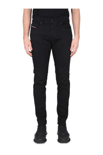 Diesel men’s slim fit black jeans showing back side with subtle branding on the back pocket