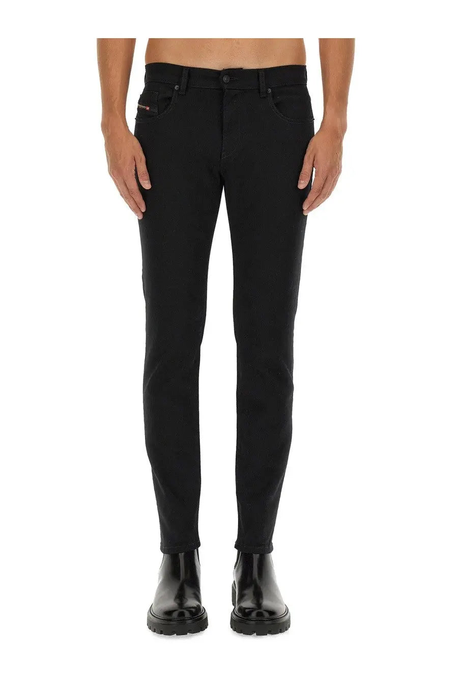 Diesel men’s black slim-fit denim jeans with a subtle logo on the waistband shown from the back side
