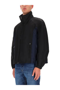 Diesel men’s Kaye jacket black windbreaker in black and navy blue with high collar zipper closure and zippered pockets