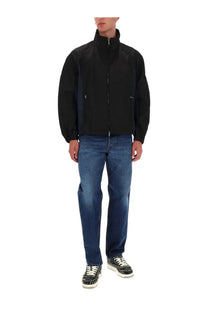 Diesel men’s Kaye jacket black featuring a black and navy blue zip-up lightweight synthetic fabric with high collar