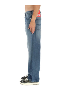 Blue diesel men’s macro jeans made of denim with a red diesel label at the waistband