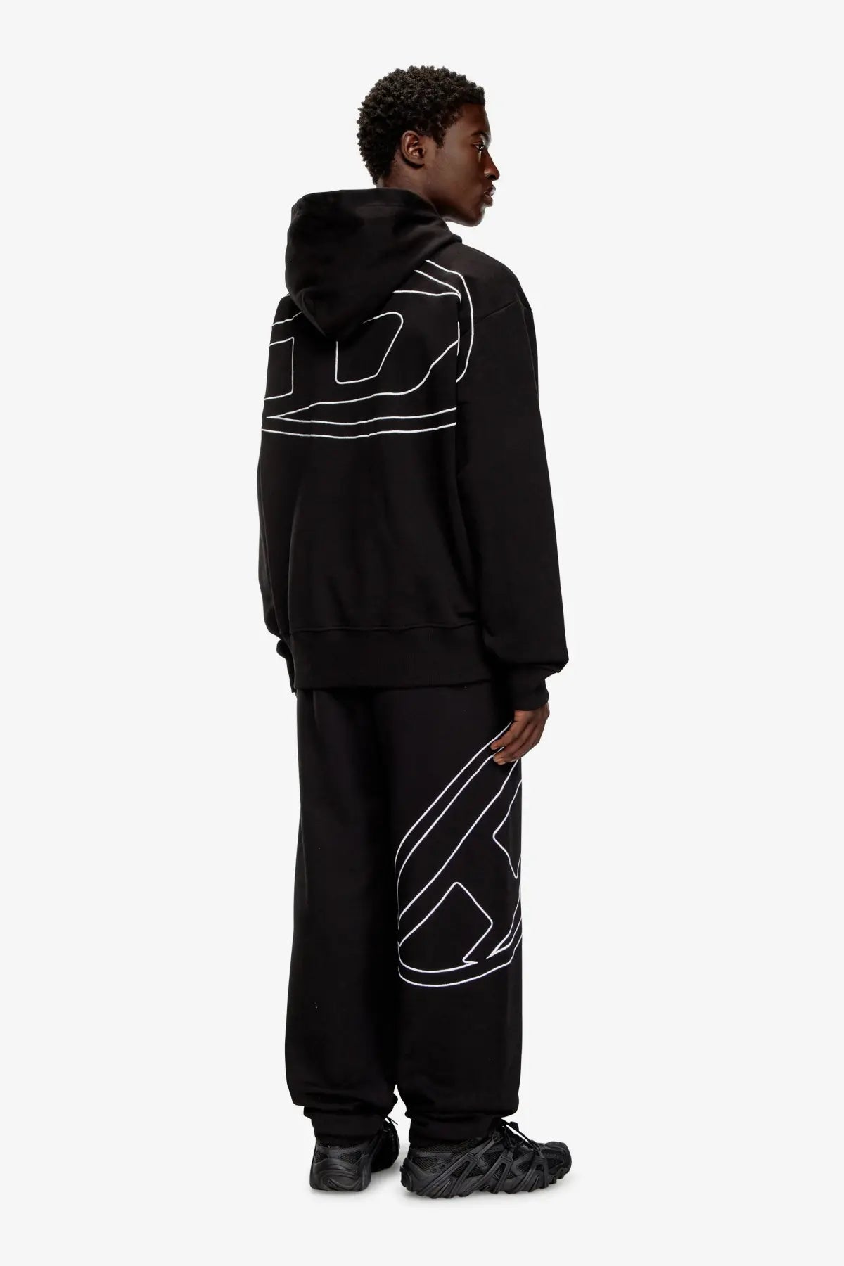 Back of diesel men’s macs cotton sweatshirt black hoodie with white geometric line art and relaxed fit drawstring hood