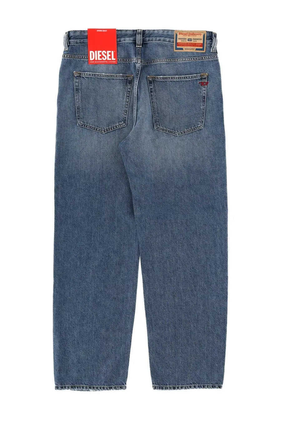 Blue denim jeans with faded wash and red diesel brand tag on waistband in diesel men’s macs jeans blue