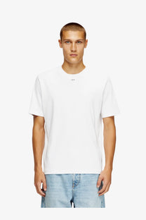White cotton crewneck t-shirt with a small minimalist logo at the neckline from diesel mens madjust tr cotton shirt white
