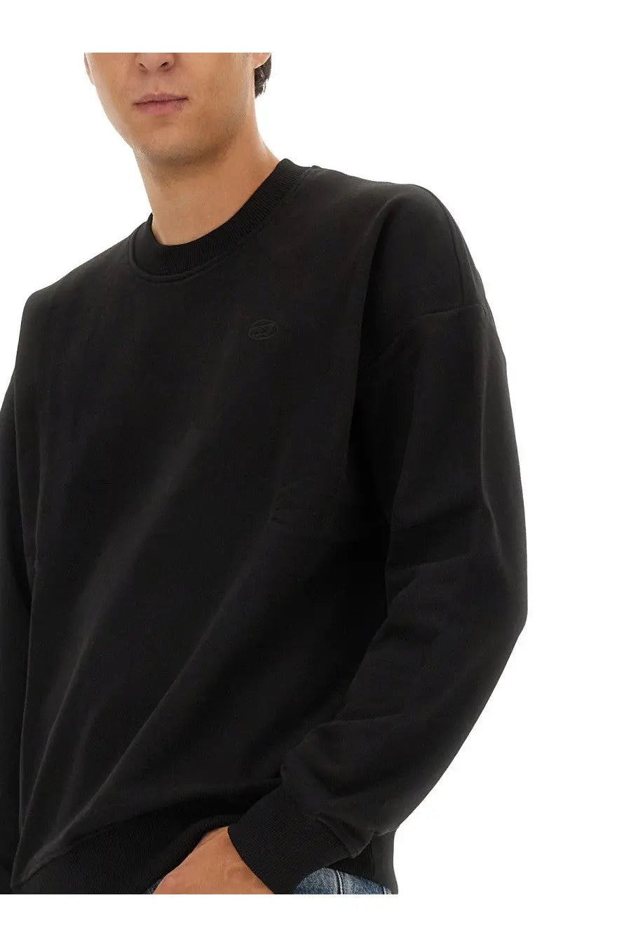Diesel men’s Rob Megoval black crewneck sweatshirt with subtle embroidered logo on the left chest