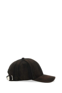 Black corduroy baseball cap with white plastic buckle on adjustable strap shown from the back for diesel men