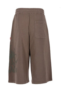 Diesel men’s sweatshorts in brown with elastic waistband and subtle green plant graphic on the left leg