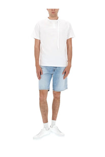 White short-sleeved t-shirt with stand-up collar and drawstring detail paired with diesel men’s denim blue shorts