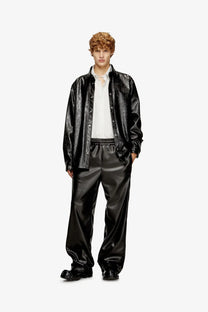 Diesel men’s simply Qmbu black faux leather bomber jacket with subtle embossed detailing front view