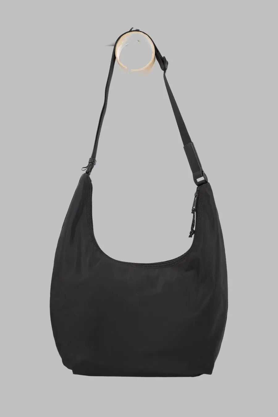Diesel unisex black nylon hobo bag with adjustable shoulder strap and zipper closure for everyday use