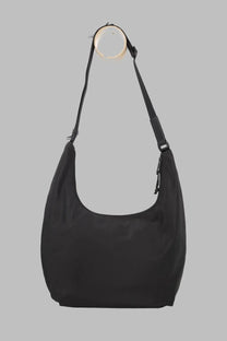 Diesel unisex black nylon hobo bag with adjustable shoulder strap and zipper closure for everyday use