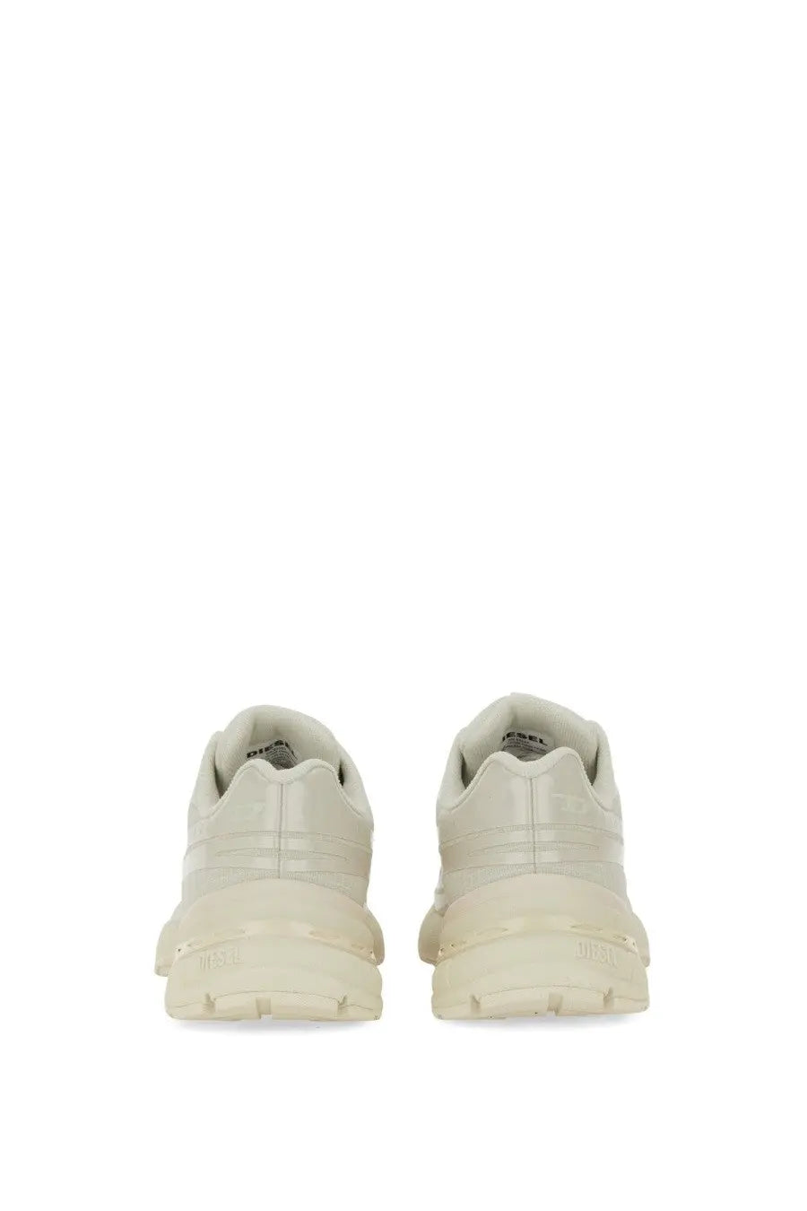 Cream-colored diesel women’s airspeed sneaker with glossy finish chunky sole and minimalist design in white