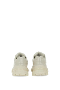 Cream-colored diesel women’s airspeed sneaker with glossy finish chunky sole and minimalist design in white