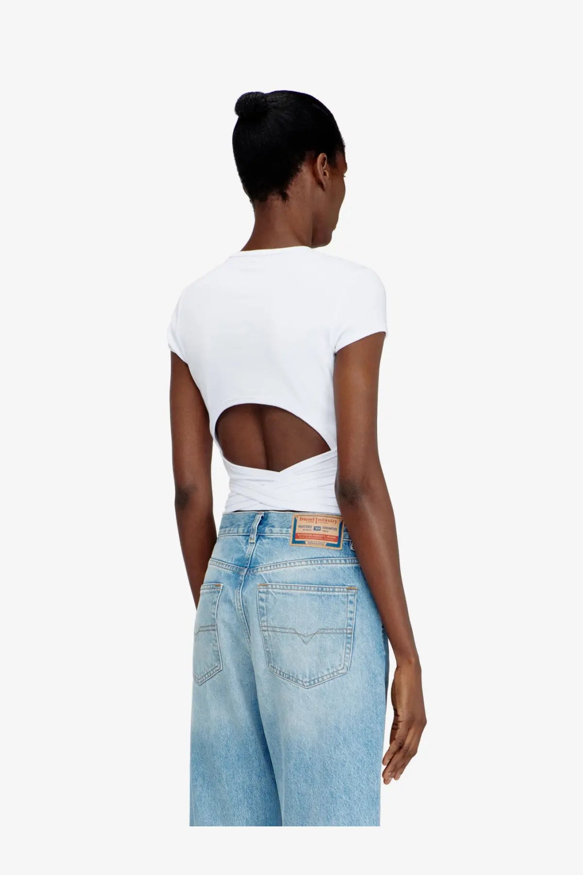 White cropped short-sleeve cotton top with back cutout design from diesel women’s bunny tail s1 shirt shown from back