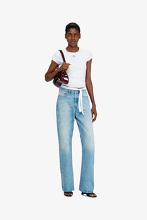 A glossy burgundy handbag with a structured shape and small logo paired with diesel women’s bunny tail s1 cotton shirt white