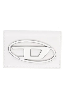 White leather diesel women’s card holder featuring a silver-toned oval logo with embossed d design