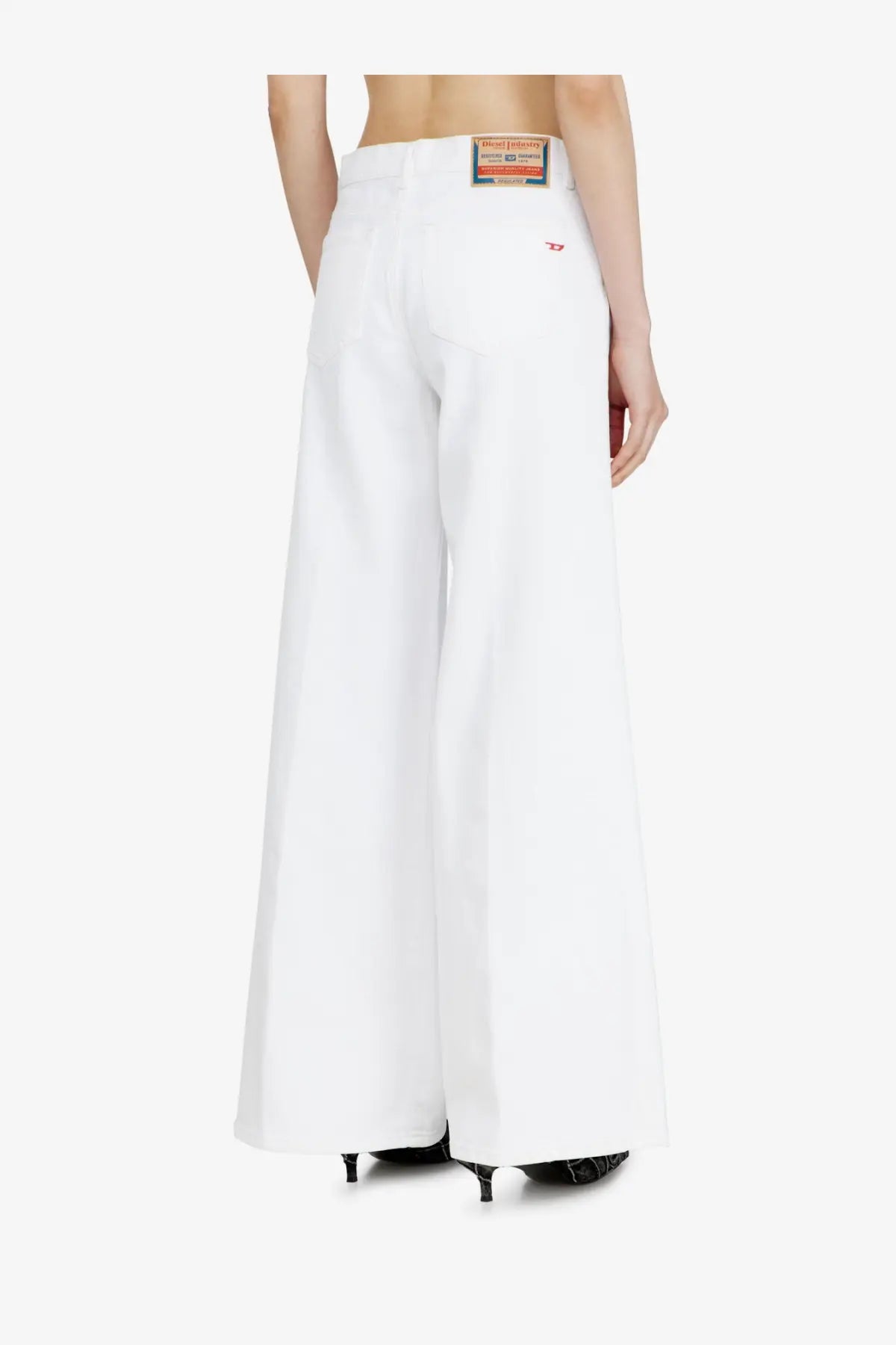 Diesel women’s white cotton blend trousers with wide-leg fit, minimalist design, and subtle branding details