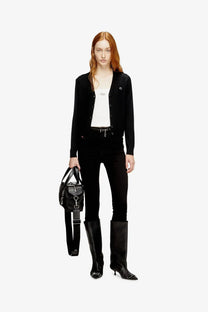Black leather shoulder bag with structured design and silver toned hardware accents for stylish carrying