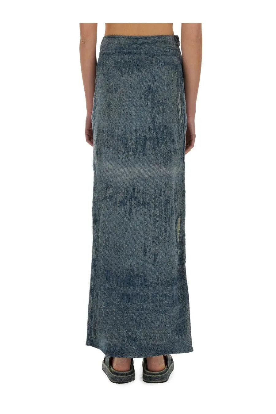 Diesel women’s denim long skirt in faded blue wash with a distressed texture and flowing design