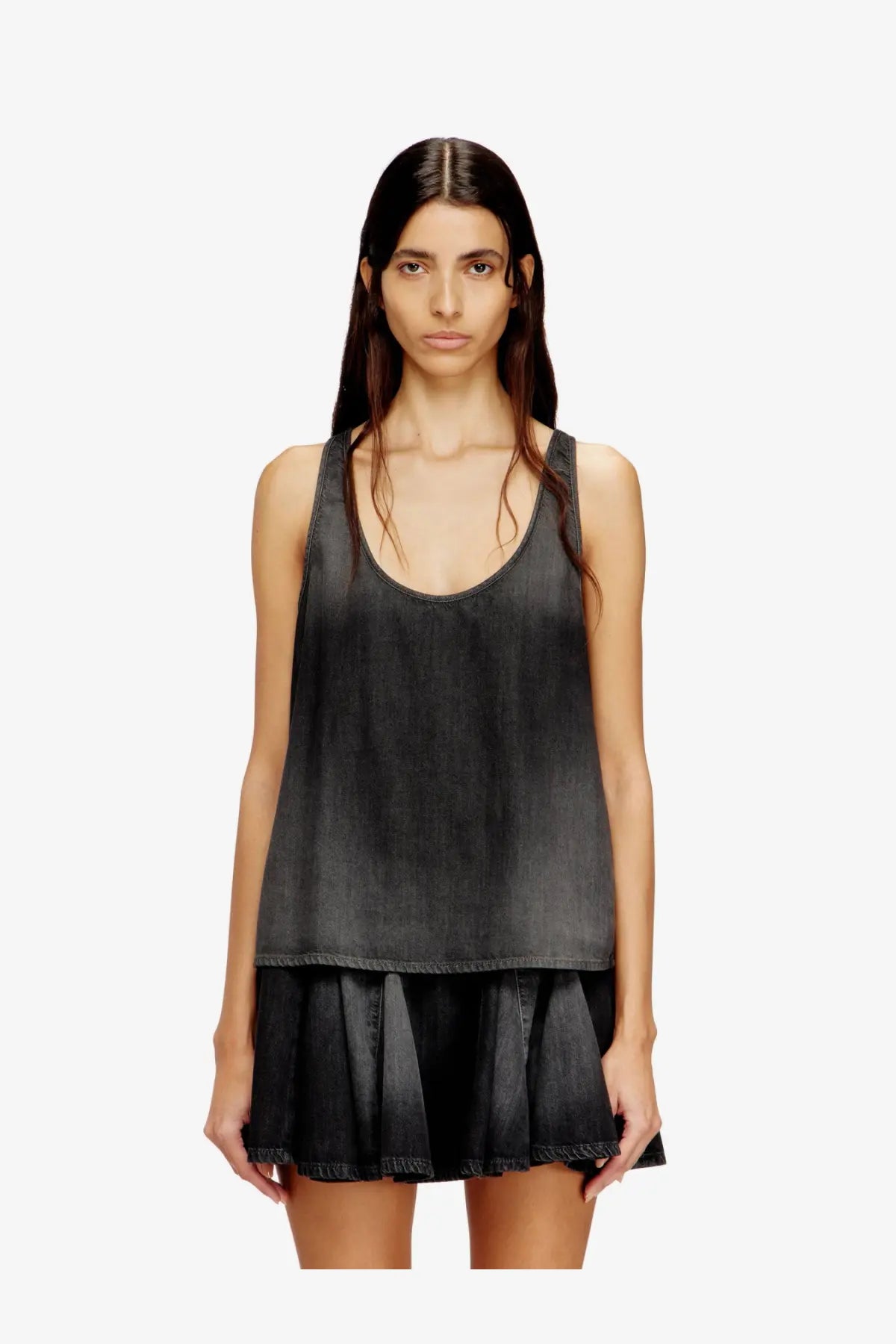 Diesel women’s black denim tank top with flared hem and ruffled skirt detail made of cotton and lyocell
