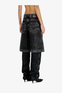 Diesel women’s black denim bermuda shorts with faded distressed finish and visible brand label at waistband