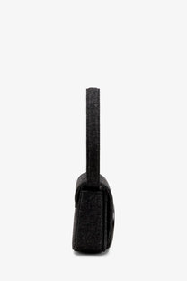 Diesel women’s denim shoulder bag in black with a sleek glittery handbag and matching handle design
