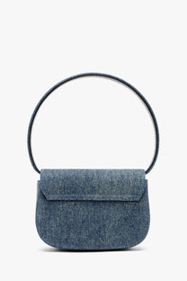Diesel women’s denim shoulder bag blue with a denim blue mini handbag and circular handle for stylish carrying