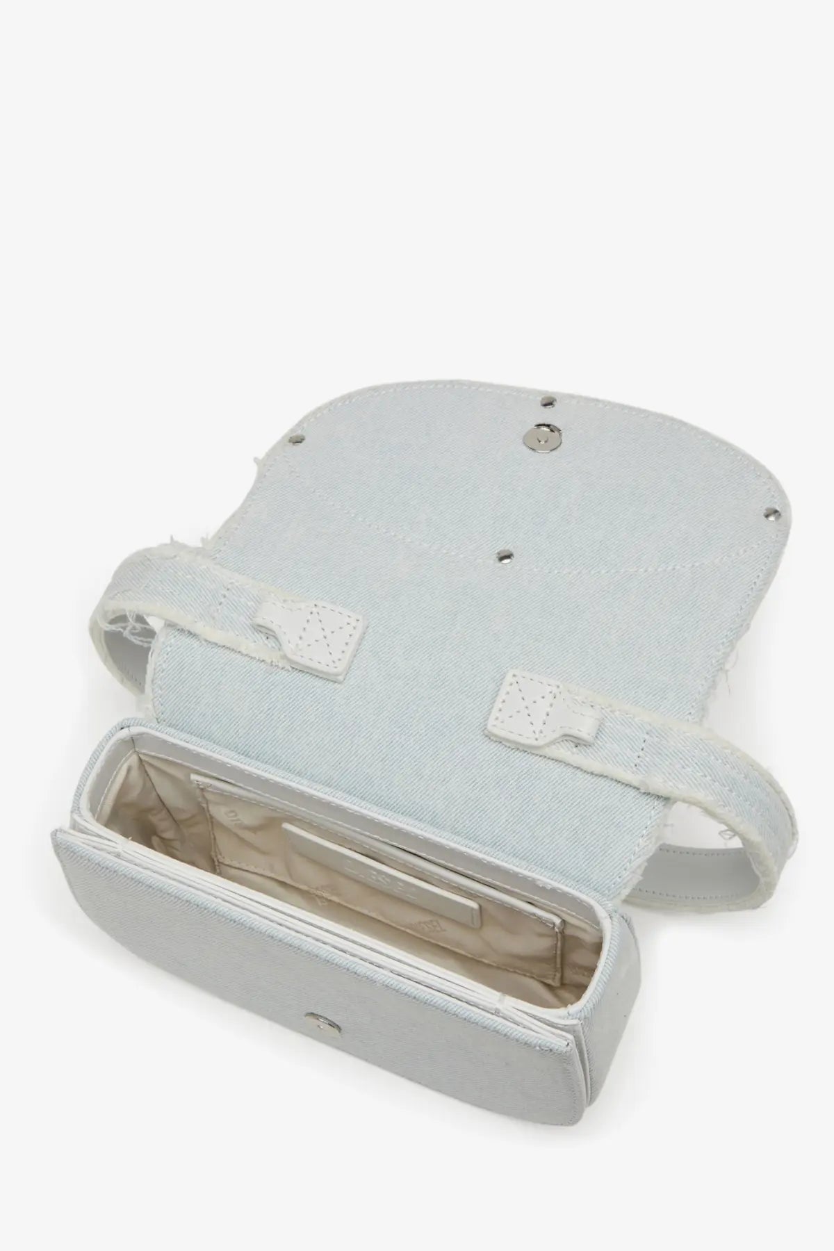 Diesel women’s light blue denim shoulder bag with white leather straps and silver hardware in grey tone