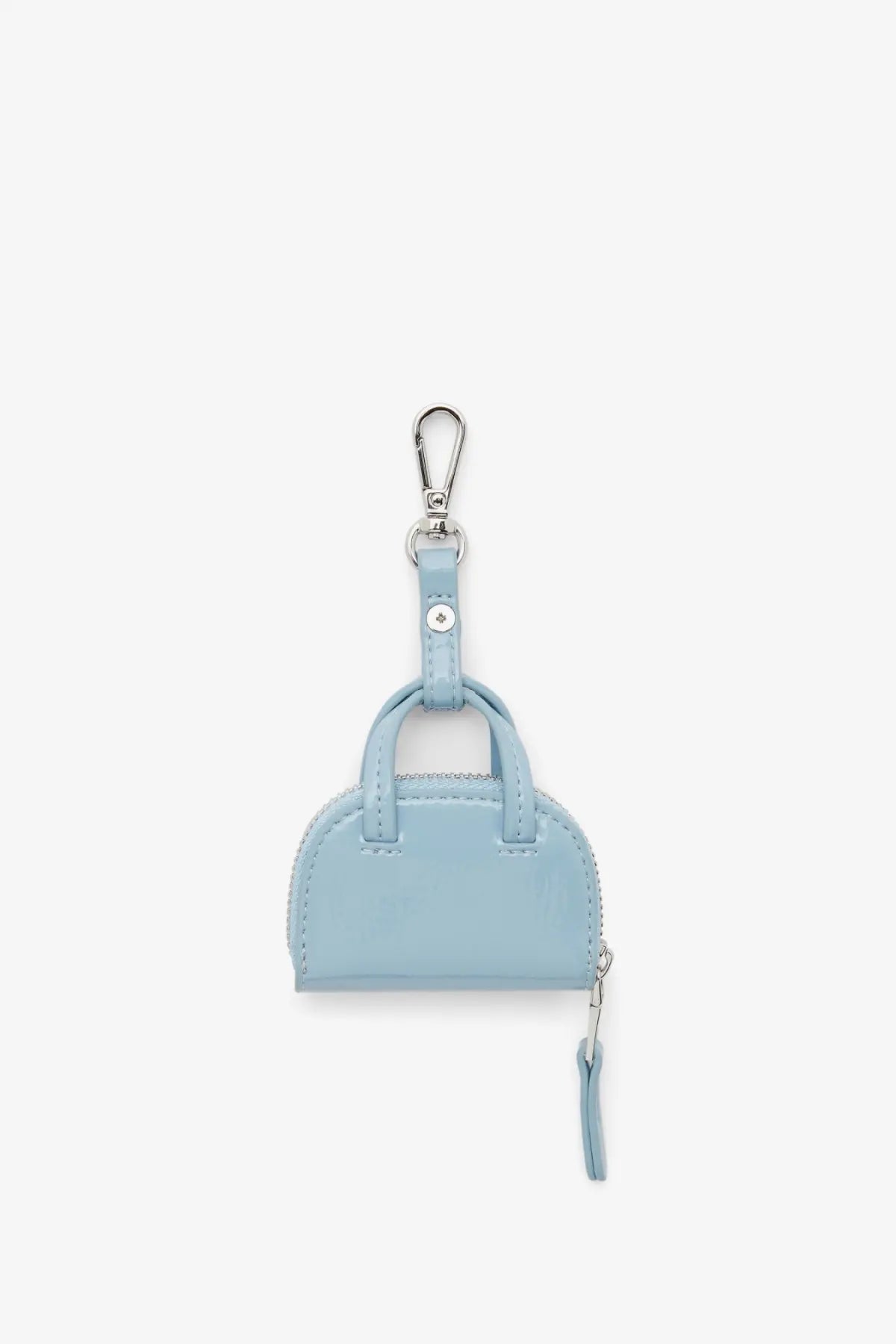 Diesel women’s dome charms pvc keychain in light blue with silver carabiner clip and matching zipper pull