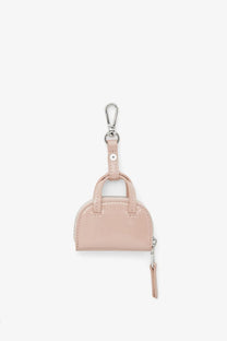 Diesel women’s dome charms pvc keychain in blush pink mini handbag design with silver carabiner and zipper pull