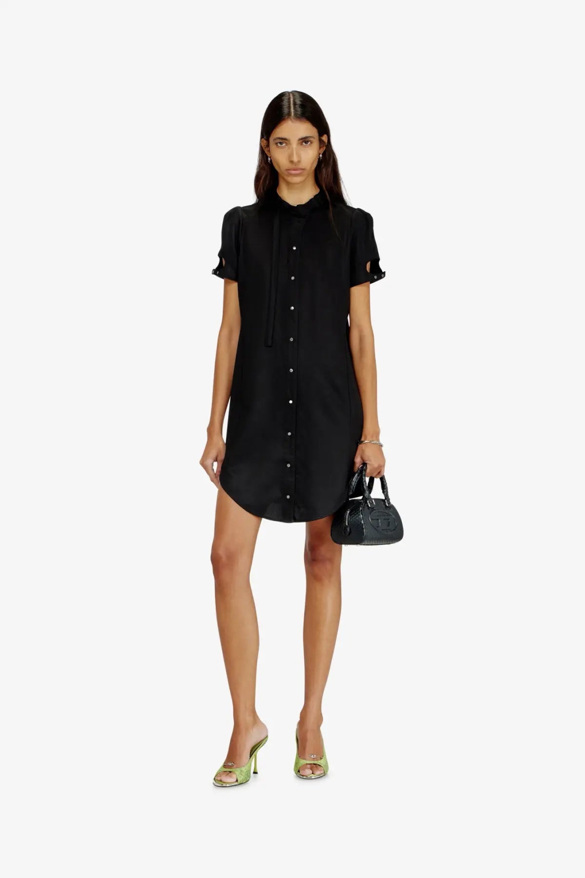 Black button-down dress with short flutter sleeves and high neckline paired with diesel women dome python leather crossbody bag black