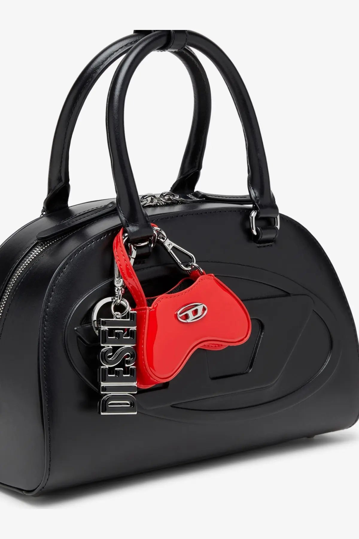 Black glossy leather Diesel women’s handbag with red heart-shaped keychain and silver Diesel charm