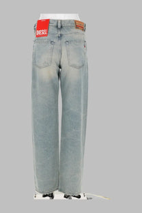 Back view of diesel women’s light-wash denim jeans ark blue with wide-leg cut and brand label on waistband