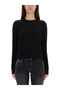 Diesel womens black long-sleeved knit top with subtle logo at neckline made from soft jersey fabric