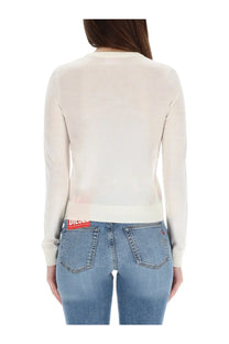 Back view of a cream-colored diesel women’s jersey alinesa knit sweater with ribbed hem and cuffs made of soft fabric