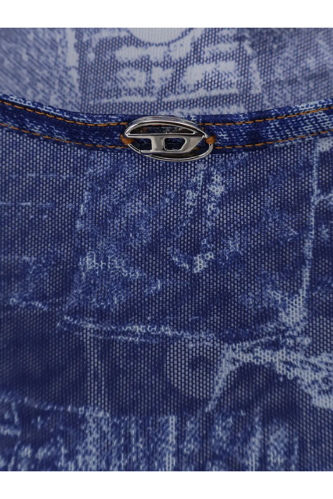 Silver metallic oval logo tab with embossed lettering sewn on blue denim on the back of diesel womens kasia shirt grey
