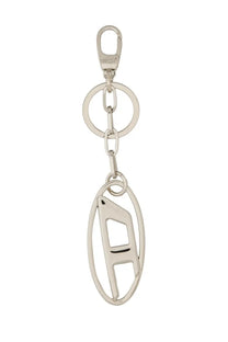 Diesel women’s silver metallic keychain with an oval cutout and abstract geometric design in silver metal