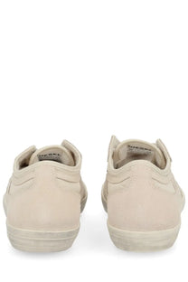Diesel women’s Leroji low sneaker in beige suede with clean minimalist design and white rubber soles
