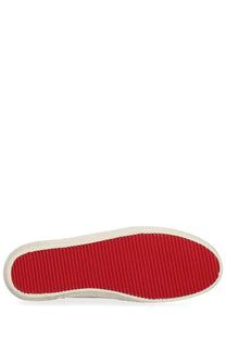 Diesel women’s leroji low sneaker white with red rubber sole featuring textured ribbed pattern and white sidewall