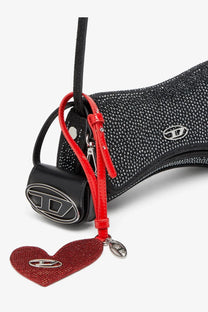 Diesel women’s micro leather charm black featuring a red glitter heart charm with silver logo on red leather strap