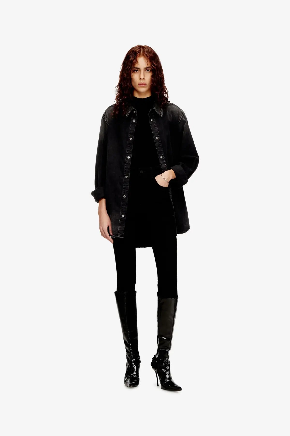 Black denim jacket with contrasting dark stitching and silver-toned buttons worn over diesel women’s mokky sl microdiv tank top