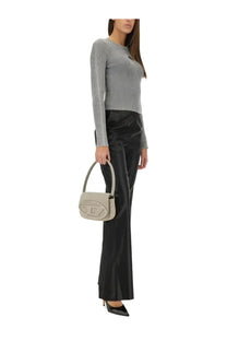 A sleek light gray leather handbag with minimalist design and embossed logo featured with diesel women’s pants lumys black