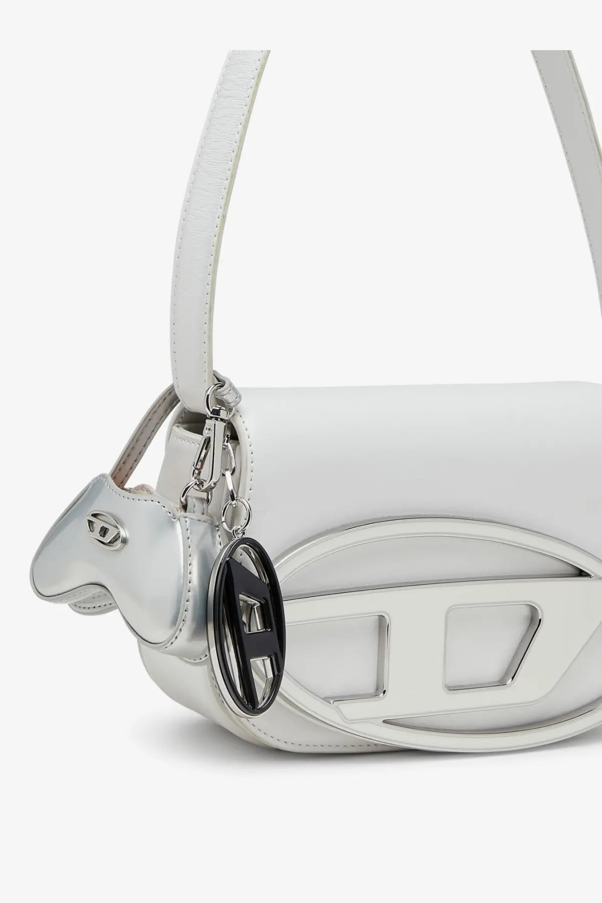 White leather Diesel women’s handbag featuring a silver metallic sheep charm and black circular logo pendant