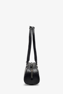 Diesel women’s black snake print leather crossbody bag with sleek rounded silhouette and braided straps