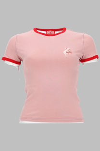 Pink diesel t-shirt with red and white trim on collar sleeves and hem from diesel women’s shirt con stampa blue collection