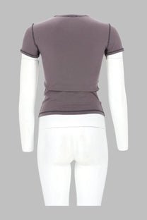 Diesel women’s fitted short-sleeved gray shirt with dark stitching and heart stud print in solid fabric