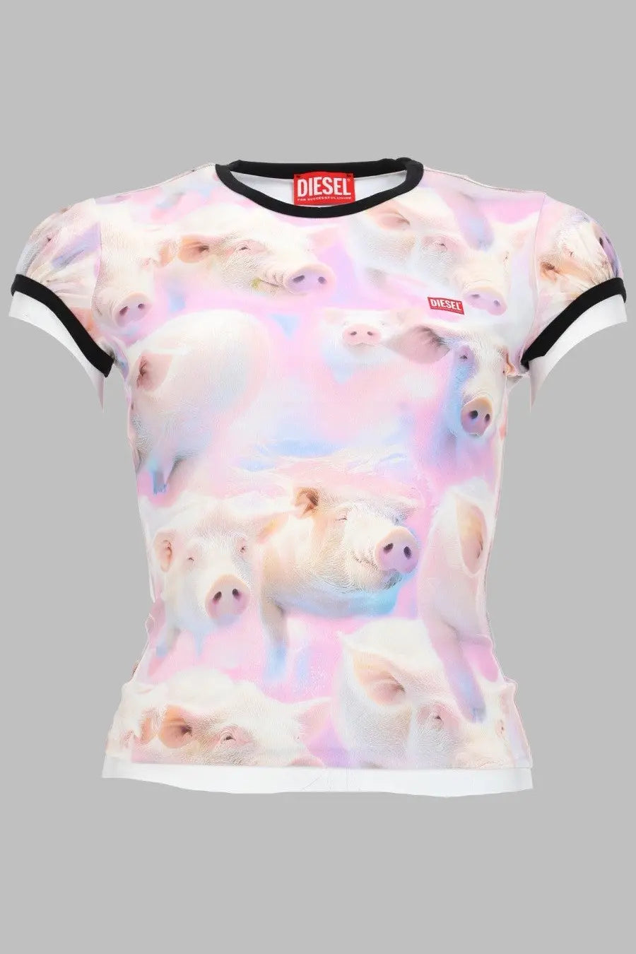 Diesel women’s graphic tee in pink and white with multicolor pig pattern and black trim on neckline and sleeves